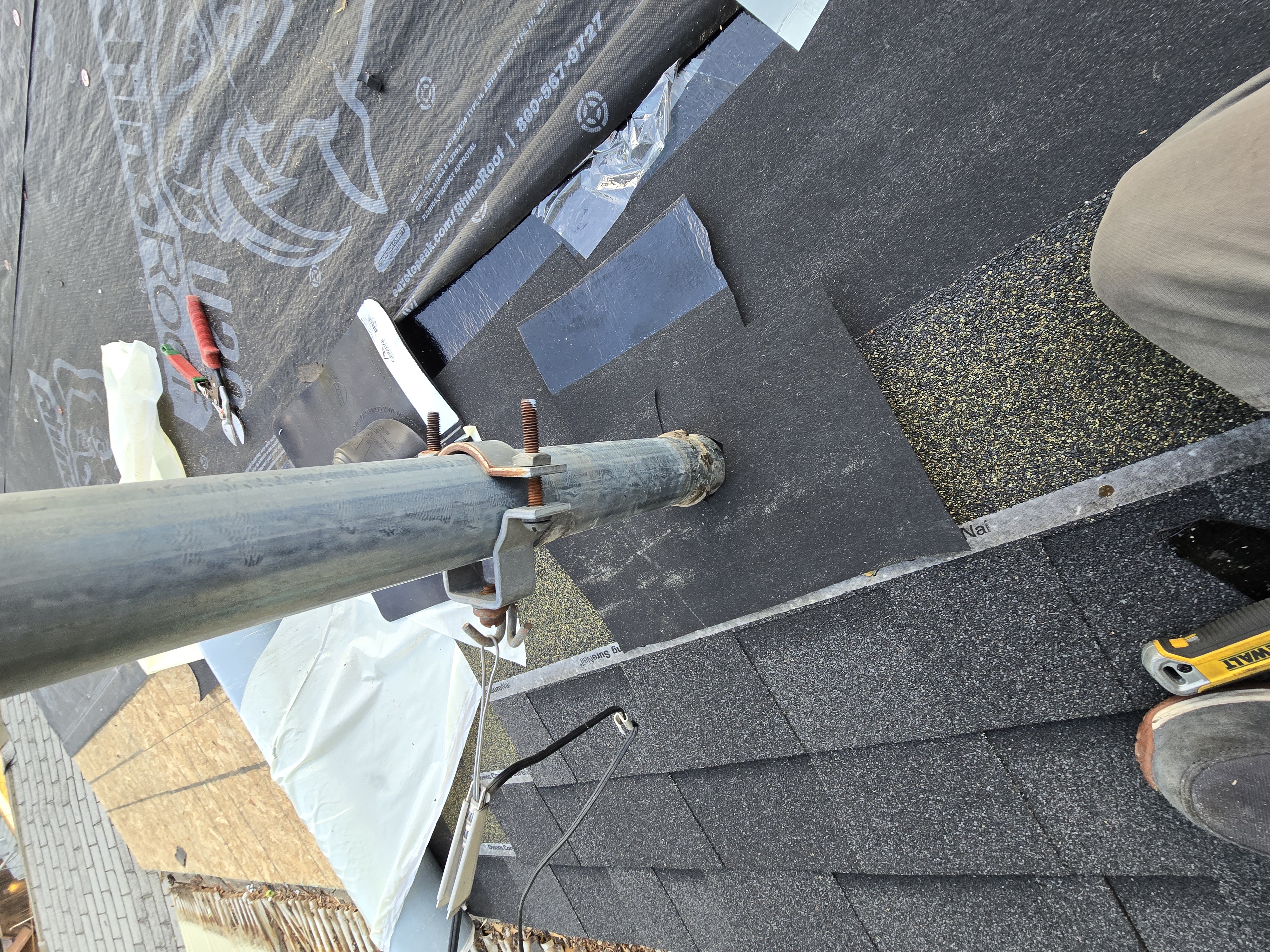 Crew re-decking a roof with new OSB panels