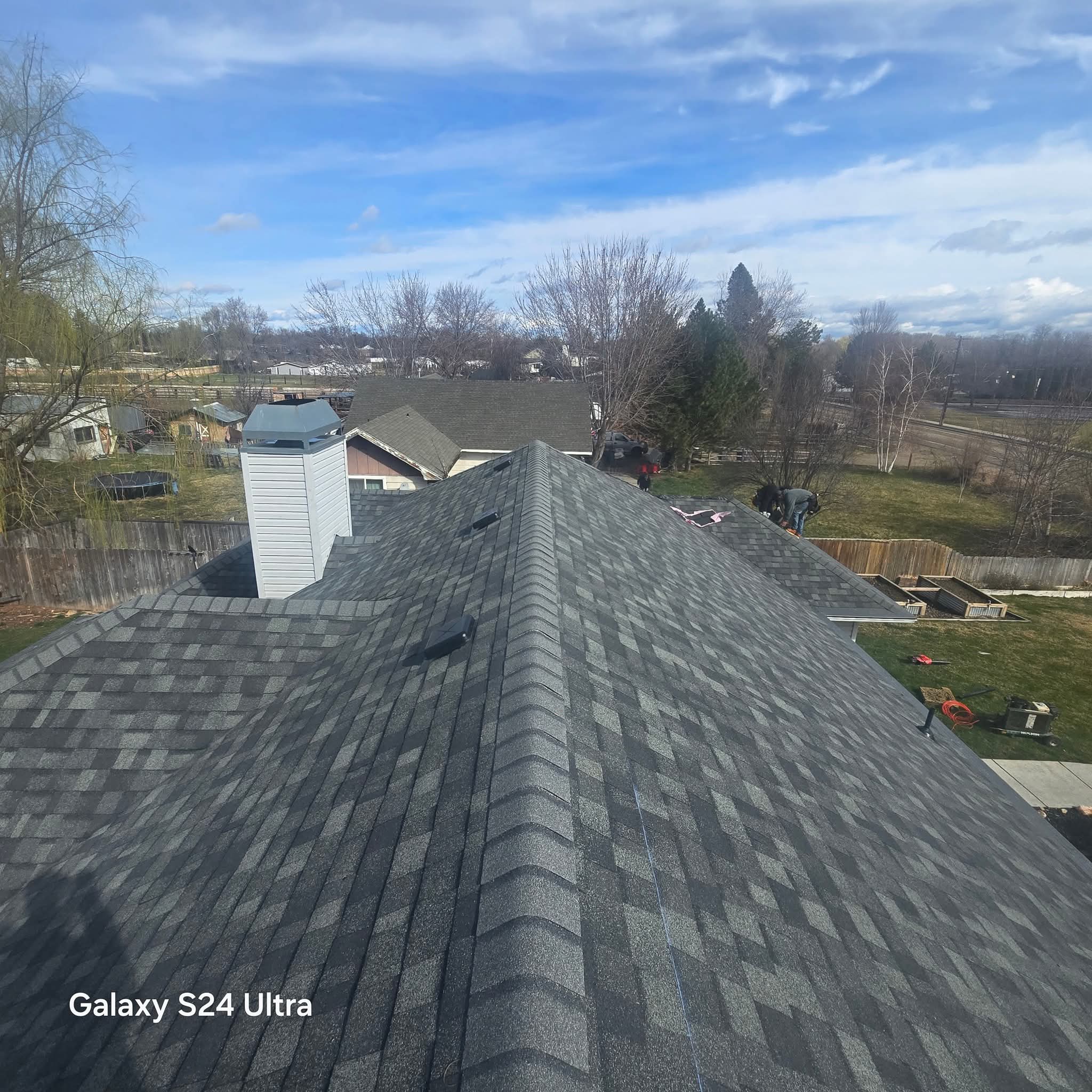 Finished architectural shingle roof in two tones