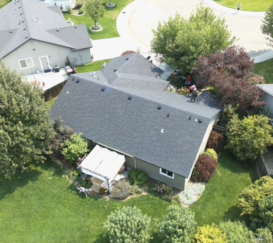 Drone view of a finished dark shingle roof by High Command Roofing