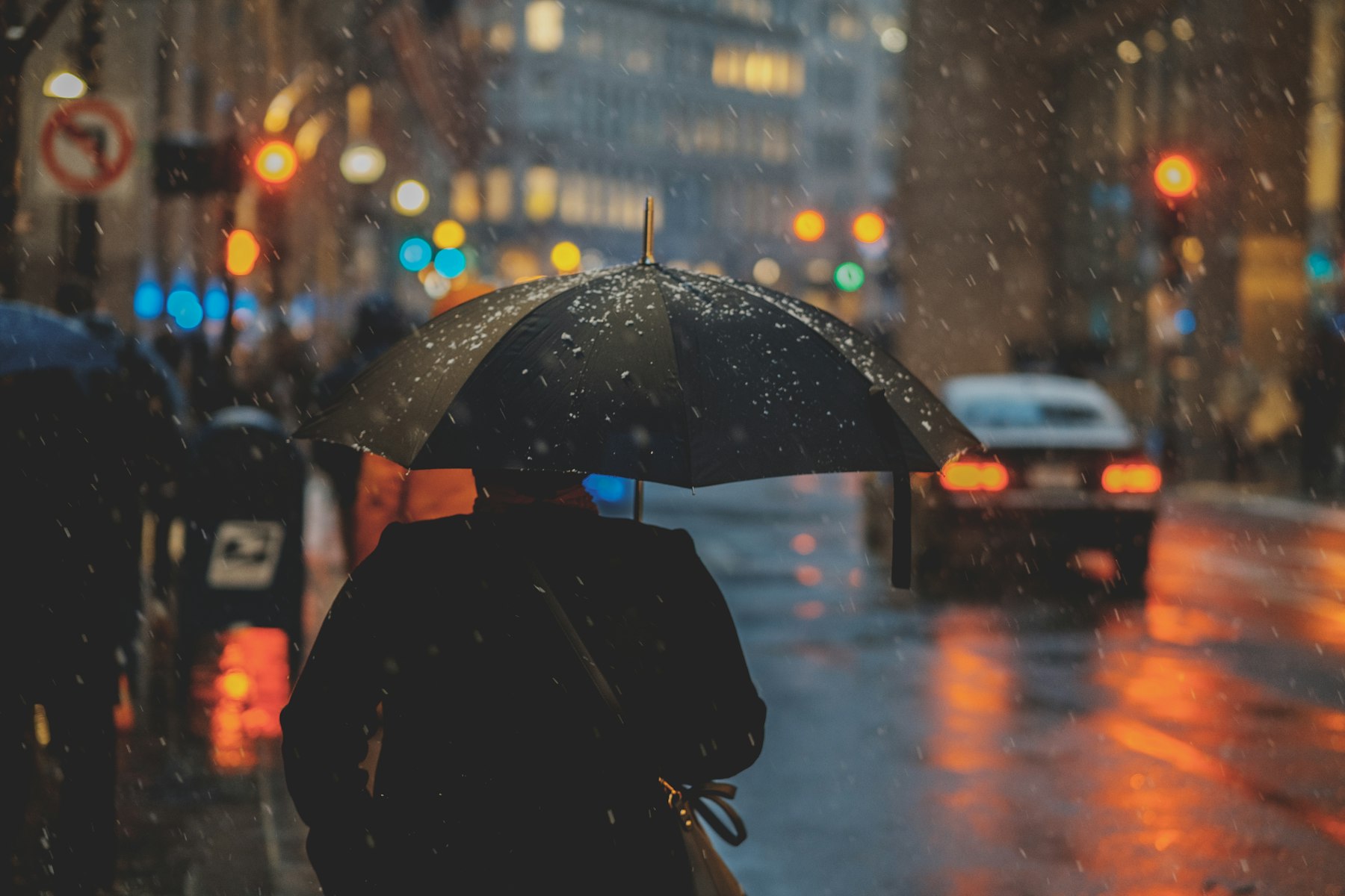 Heavy rain beading off a waterproofed surface